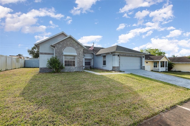 ranch-style home with a garage, brick siding, fence, driveway, and a front lawn