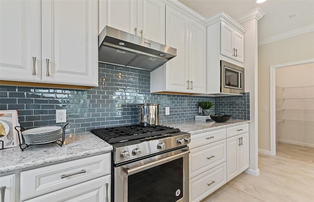 kitchen featuring white cabinets, ornamental molding, ventilation hood, appliances with stainless steel finishes, and tasteful backsplash