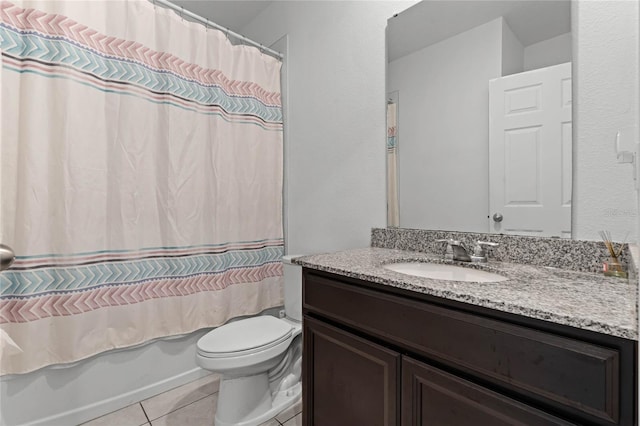 bathroom with shower / bath combination with curtain, vanity, toilet, and tile patterned floors