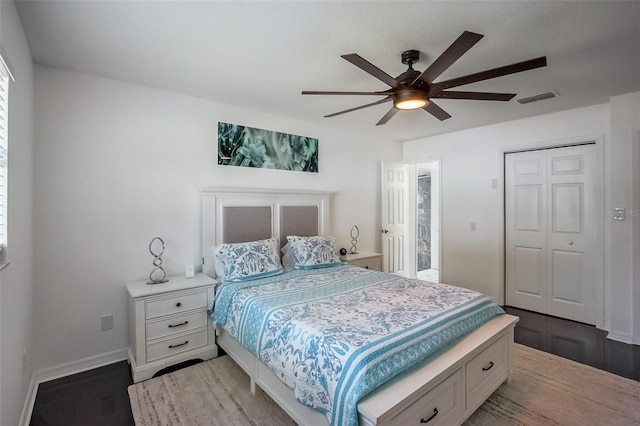 bedroom with ceiling fan, a closet, visible vents, and baseboards