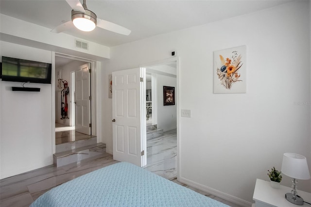 bedroom with a ceiling fan, visible vents, and baseboards