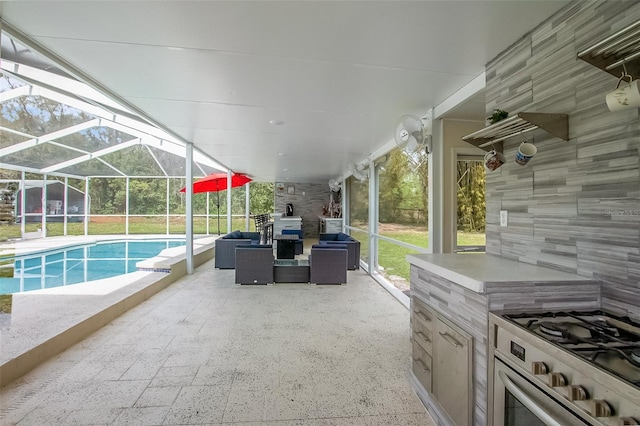 view of patio / terrace with glass enclosure, an outdoor living space, and an outdoor pool