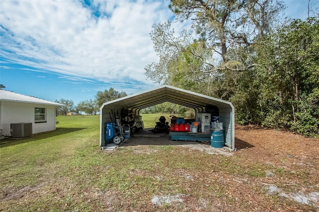 view of parking with a detached carport and driveway