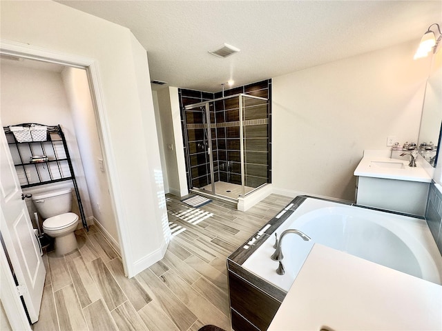 full bathroom featuring visible vents, wood tiled floor, a shower stall, a garden tub, and toilet