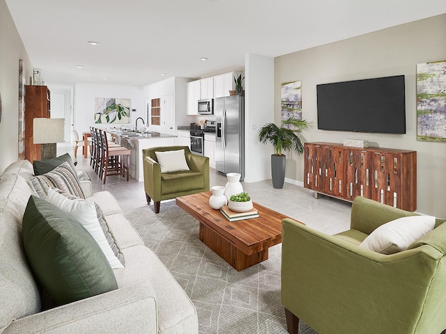 living room featuring recessed lighting and light tile patterned flooring