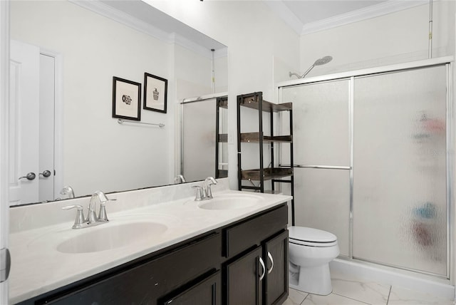 full bath featuring marble finish floor, crown molding, a sink, and a shower stall