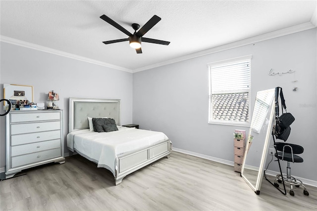 bedroom featuring a textured ceiling, wood finished floors, and crown molding