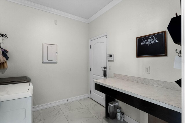 laundry area featuring laundry area, baseboards, marble finish floor, crown molding, and washing machine and dryer