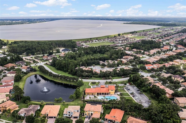 aerial view featuring a water view and a residential view