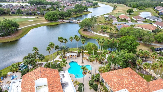 124 Meridian Ave, Poinciana, FL 34759 - drone / aerial view of a large body of water, a pool area, and a local golf course