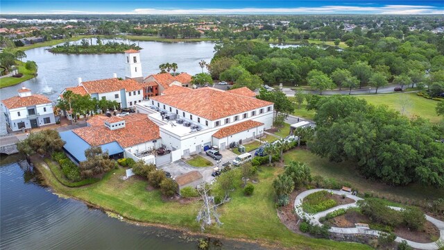 124 Meridian Ave, Poinciana, FL 34759 - bird's eye view of a nearby body of water and a tree filled landscape