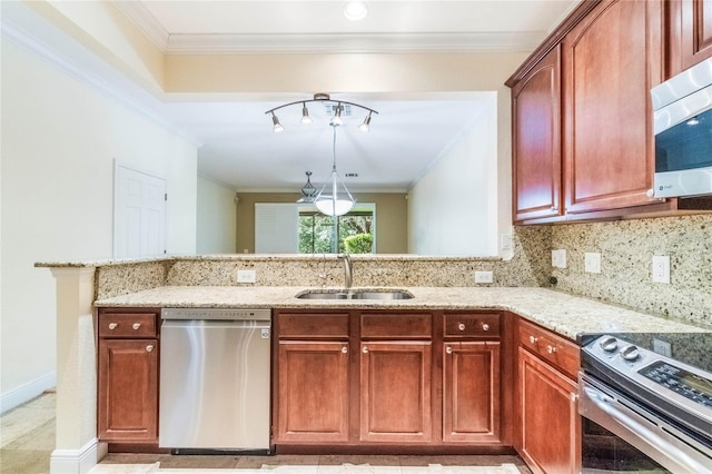 kitchen featuring appliances with stainless steel finishes, crown molding, a sink, and light stone counters