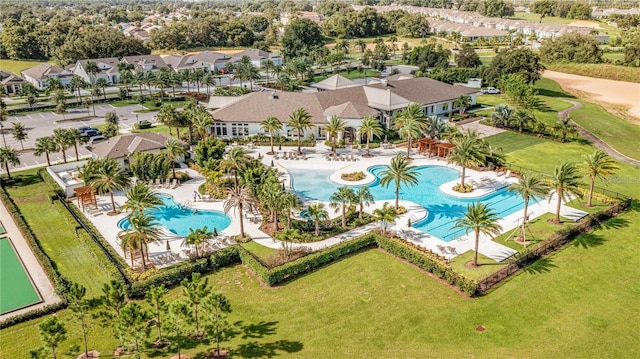 birds eye view of property with a residential view