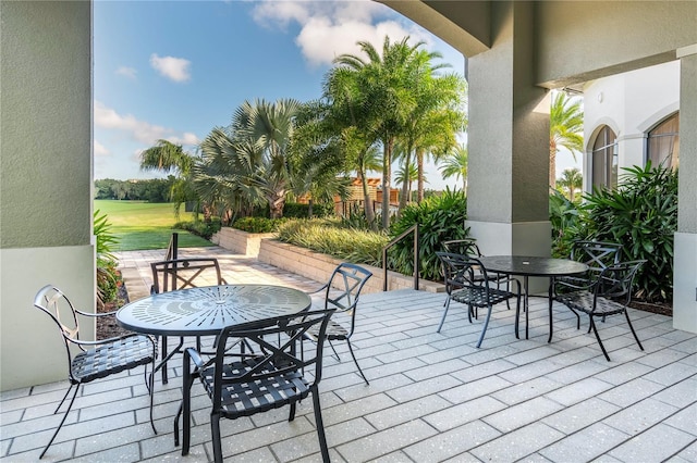 view of patio featuring outdoor dining space