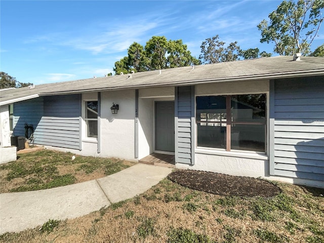 2052 Sheffield Ct, Oldsmar, FL 34677 - view of exterior entry with stucco siding