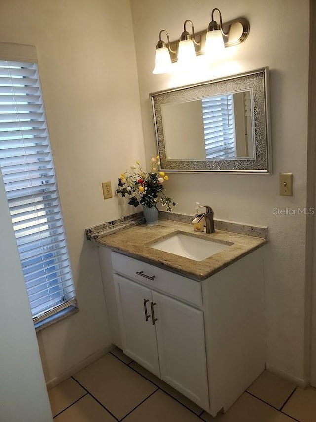 bathroom with vanity and tile patterned floors