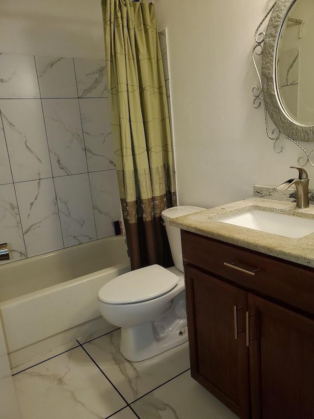 full bathroom with marble finish floor, shower / bath combination with curtain, vanity, and toilet