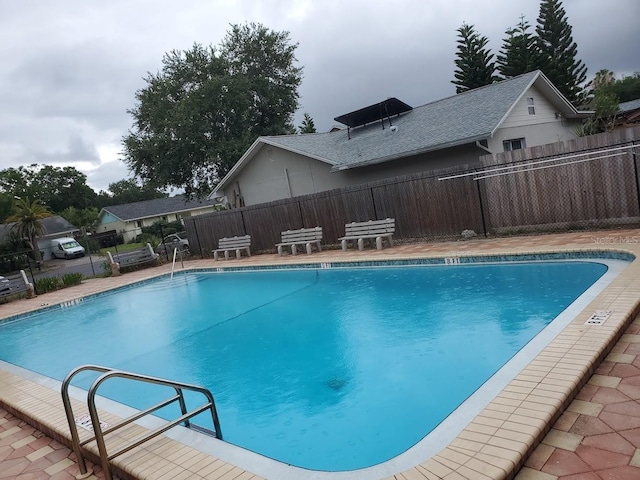 pool featuring fence