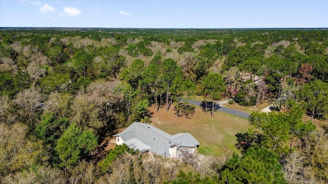 bird's eye view with a forest view