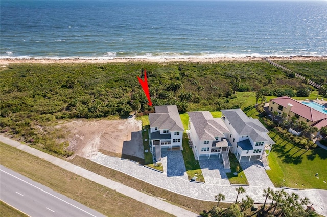 bird's eye view with a view of the beach and a water view