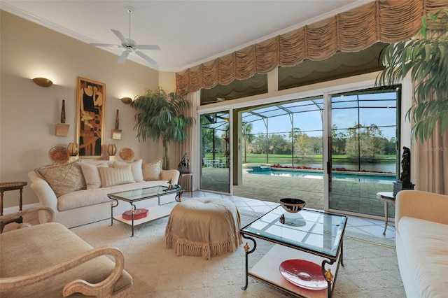 living area featuring a sunroom, ceiling fan, and crown molding