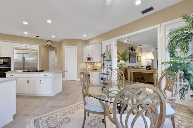 dining room featuring recessed lighting, visible vents, and light tile patterned floors