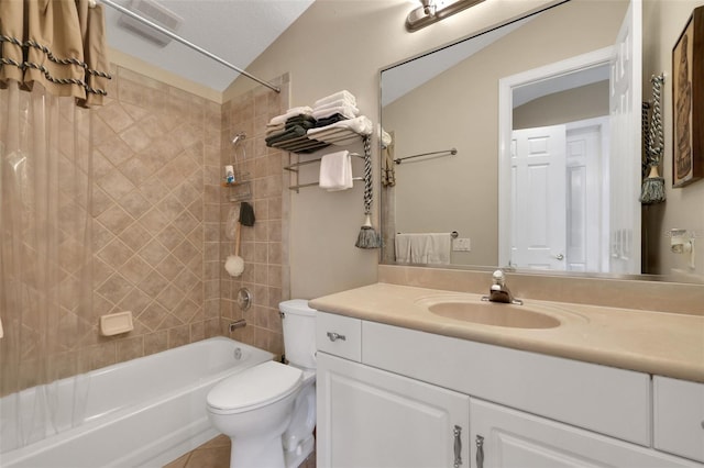 bathroom featuring shower / bathtub combination, tile patterned flooring, toilet, vanity, and vaulted ceiling