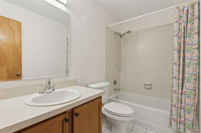 bathroom with tile patterned floors, vanity, toilet, and shower / tub combo