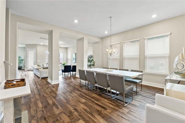 dining area with dark wood-style floors, recessed lighting, and baseboards