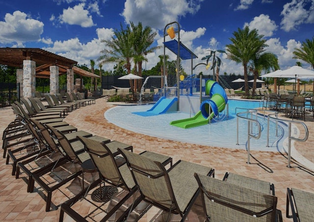 9947 Summerlake Groves St, Winter Garden, FL 34787 - community pool featuring a water play area and a water slide