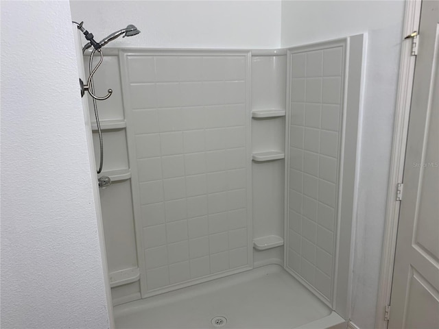 full bathroom featuring walk in shower