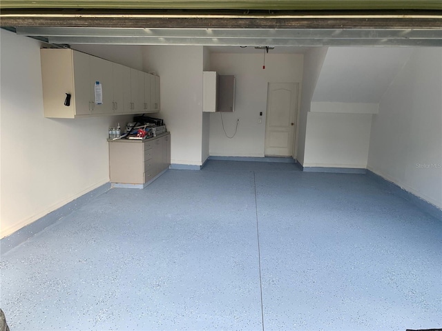 garage with baseboards