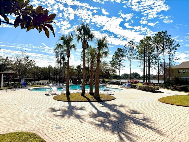 pool with a patio area