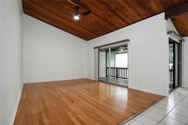 unfurnished room featuring ceiling fan, wooden ceiling, baseboards, vaulted ceiling, and light wood finished floors