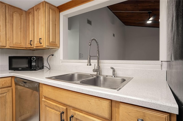 kitchen featuring light countertops, visible vents, stainless steel dishwasher, a sink, and black microwave