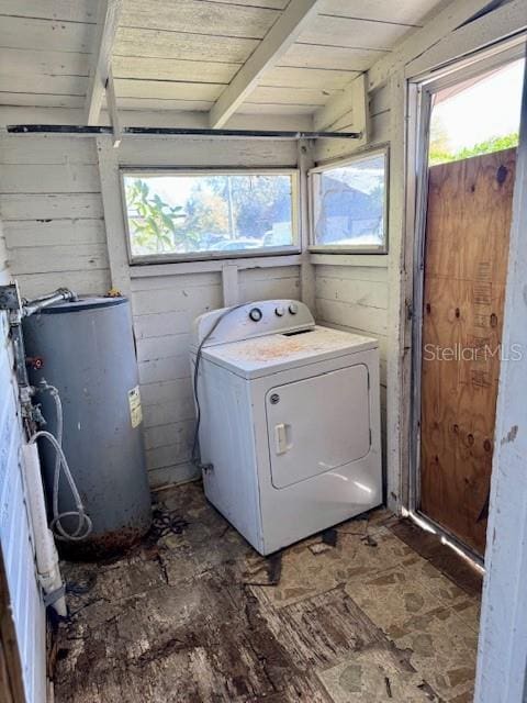 laundry room featuring wood ceiling, laundry area, washer / clothes dryer, and gas water heater