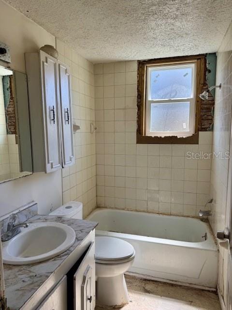 bathroom with toilet, bathtub / shower combination, a textured ceiling, and vanity