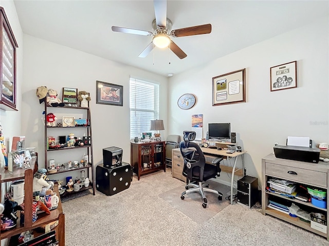 office space featuring carpet floors and ceiling fan