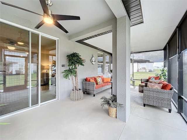 view of patio with a ceiling fan and outdoor lounge area