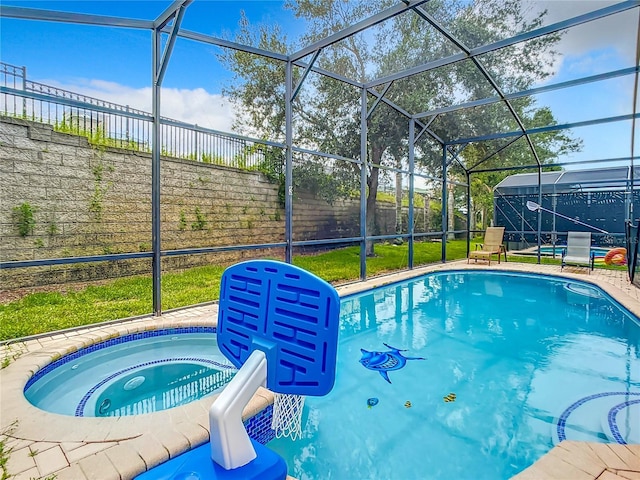 outdoor pool featuring an in ground hot tub, a patio area, a fenced backyard, and glass enclosure