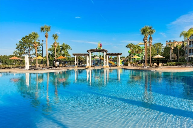 community pool with a patio area