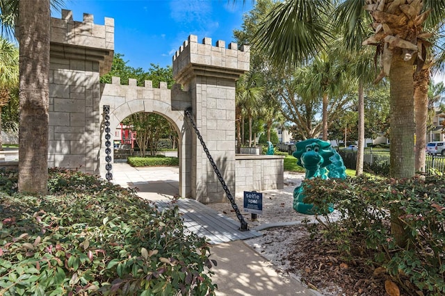 view of gate with fence