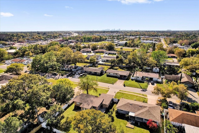 birds eye view of property with a residential view