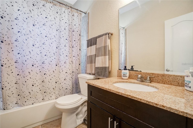 bathroom with tile patterned flooring, toilet, vanity, and shower / bathtub combination with curtain