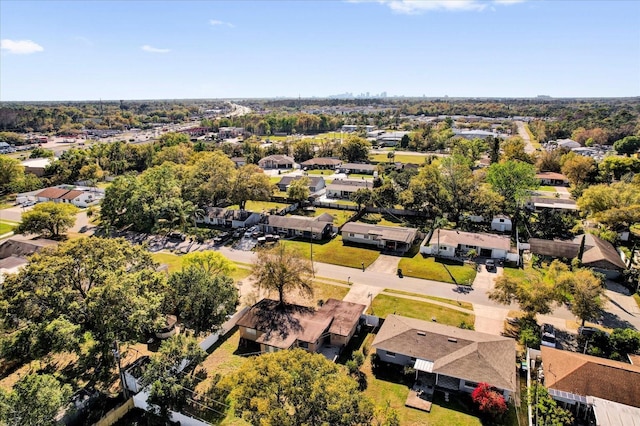 birds eye view of property with a residential view