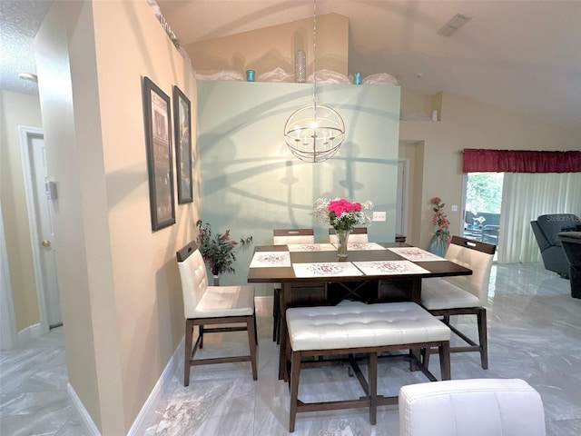 dining space featuring baseboards, visible vents, lofted ceiling, marble finish floor, and a chandelier