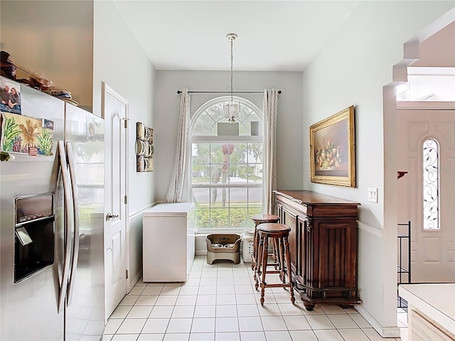 entrance foyer with light tile patterned flooring