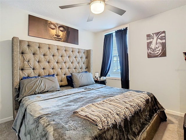 bedroom featuring carpet, baseboards, and ceiling fan