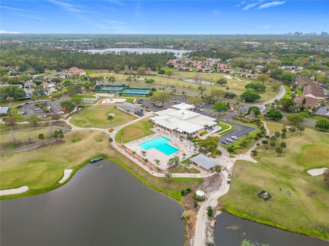 aerial view featuring golf course view and a water view