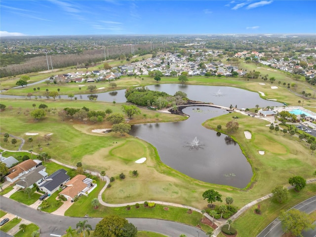 bird's eye view with view of golf course, a water view, and a residential view